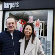 John and Kyly Harper in front of Harpers which has been in the town's High Street since 2009
