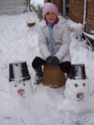 Helena Holmes, 10, of Bayworth, with her snowtwins.