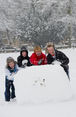 Group of lads roll a huge snow ball on the Leys playing field.
Pic: Mark Hemsworth