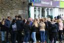 Students queue outside an estate agents to bag themselves a home for next year