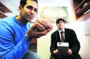 GREY MATTER: Reporter Liam Sloan, right, tests out transcranial electrical stimulation with Dr Roi Cohen Kadosh