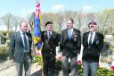 Bugler Ben Horsman, standard-bearer John Grout, Mike Lowe and Don Deaney at the cemetery