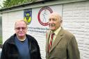 Parish council chairman Charlie Haynes with former clerk Roy Garner at the existing pavilion which it is hoped will be replaced. Picture: OX67502 Antony Moore