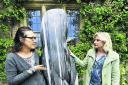 Asthall Manor’s owner Rosie Pearson, left, and co-curator of the exhibition Anna Greenacre with Aly Brown’s sculpture Hathor