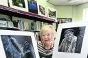 Joy Rawlins, who won the Kidlington Camera Club photography competition, with some of her pictures on show in Kidlington Library		                Picture: OX67354 Antony Moore