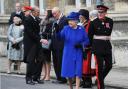 The Queen distributes Maundy money on a visit to Christ Church Cathedral in 2013