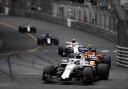 BATTLE: Williams driver Sergey Sirotkin leads McLaren’s Stoffel Vandoorne and Sauber’s Charles Leclerc during the
early stages of the Monaco Grand Prix, but a stop-go penalty saw the Russian drop back Picture: Glenn Dunbar/Williams F1