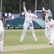 Thame Town wicket-keeper Thomas Bamford celebrates after catching Oxford Downs batsman Frankie Crouch behind off the bowling of Andrew Russell, who claimed four victims Picture: Ed Nix