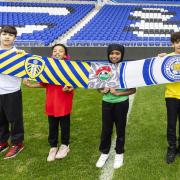 Oxford United feature on the world’s longest multi-club football scarf