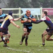 ATTACK: Witney’s Sam Collins bids to find a way through the Quins defence   Pictures: Steve Wheeler