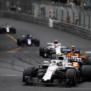 BATTLE: Williams driver Sergey Sirotkin leads McLaren’s Stoffel Vandoorne and Sauber’s Charles Leclerc during the
early stages of the Monaco Grand Prix, but a stop-go penalty saw the Russian drop back Picture: Glenn Dunbar/Williams F1