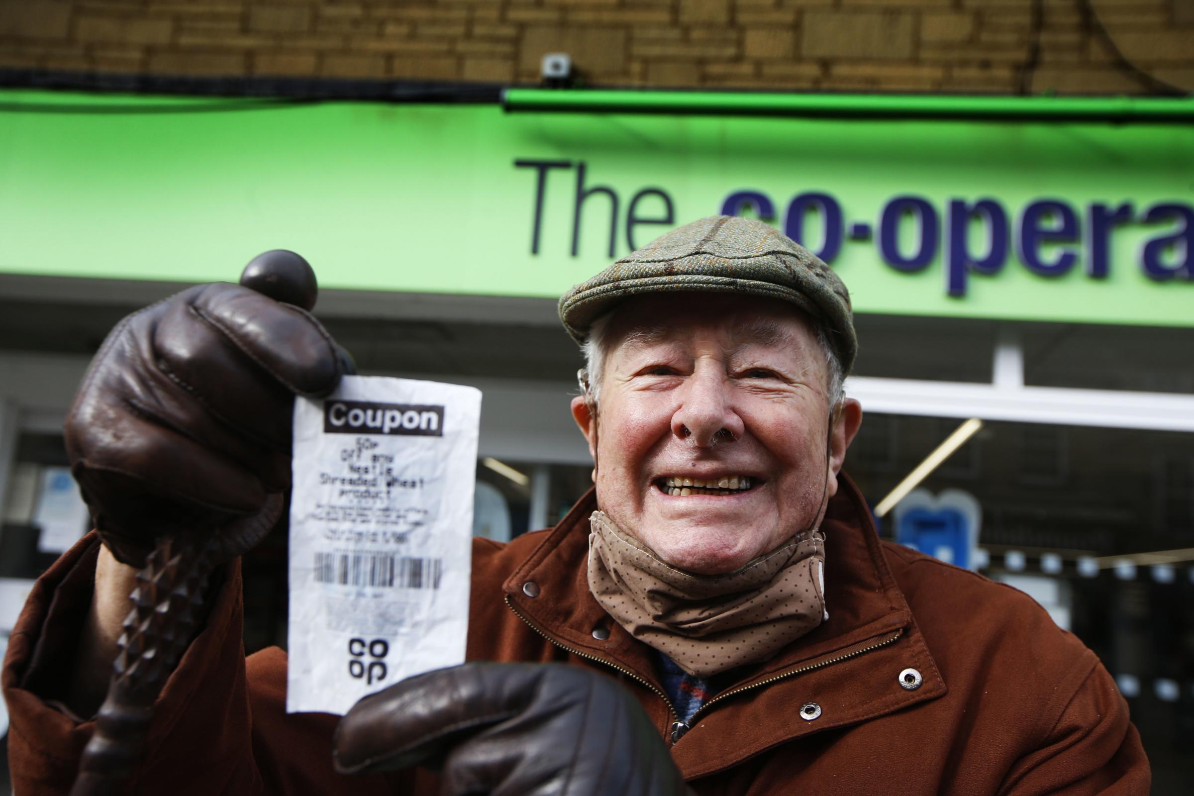 Witney pensioner John Osman collects his 50p from the Co-op after the store refused his voucher. Picture by Ed Nix