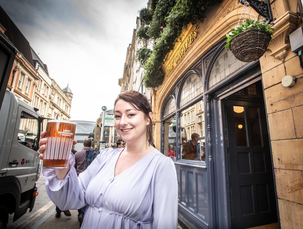 Romy Hewitt outside The Grapes after it was revamped in 2019