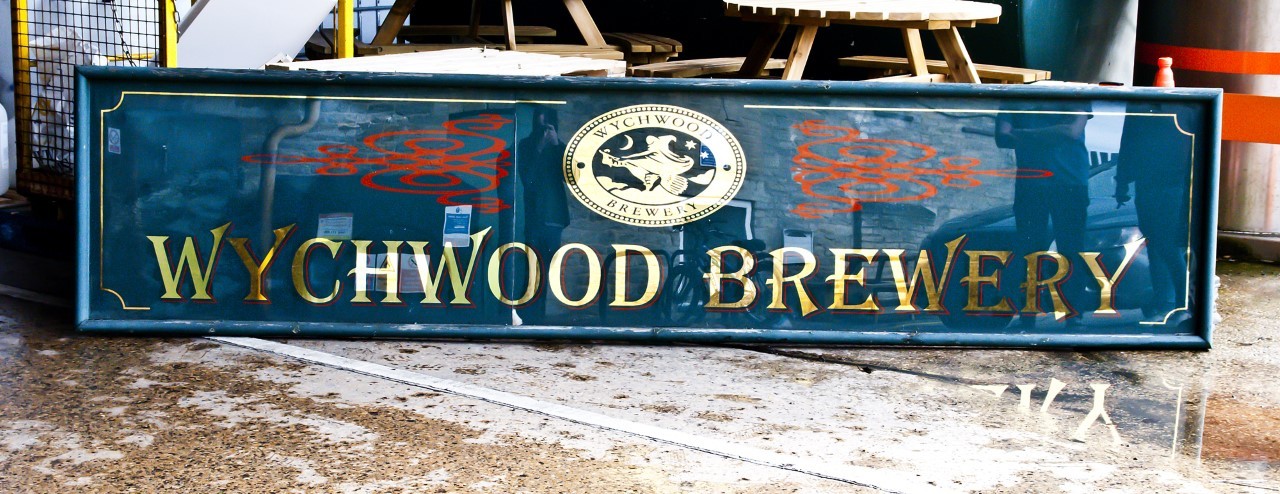 The original Wychwood Brewery sign has been sold to raise money for charity