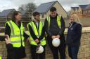 ACE apprentices Ricardo Soler De Los Rios and Connor Underwood, and apprentice training coordinator Lyndsey Fitzpatrick during a visit to the Eco Bicester site