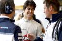 Williams driver Lance Stroll (centre) talks to head of vehicle performance Rob Smedley at Monza Picture:Glenn Dunbar/Williams F1
