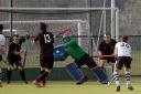 Witney goalkeeper Simon Howells saves Sam Hines’ shot during the draw with Oxford University 2nd   Pictures: Ric Mellis