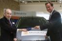 David Cameron presents the car to Bill King. 