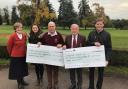 Burford present the cheques (from left): Jan Hussey (Lady President), Katie Eyton (Thames Valley Air Ambulance), Francis MacFarlane (Seniors Captain 2019), Joe Maggs MVO (Club Captain 2019) and David Roberts (Prostate Cancer UK)