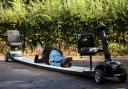 Kevin Nicks has invented the world's longest ever mobility scooter. Picture: SWNS