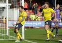 Chris Maguire celebrates after scoring Oxford United's fourth and his second goal in the 5-1 win over Crawley Town Picture: David Fleming