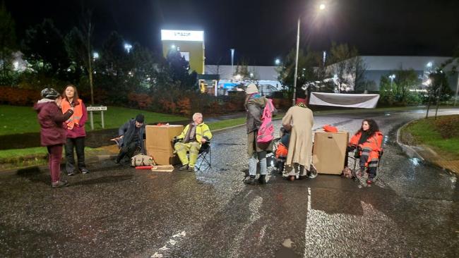 As Black Friday gets underway Extinction Rebellion have struck to blockade several Amazon warehouses (PA)
