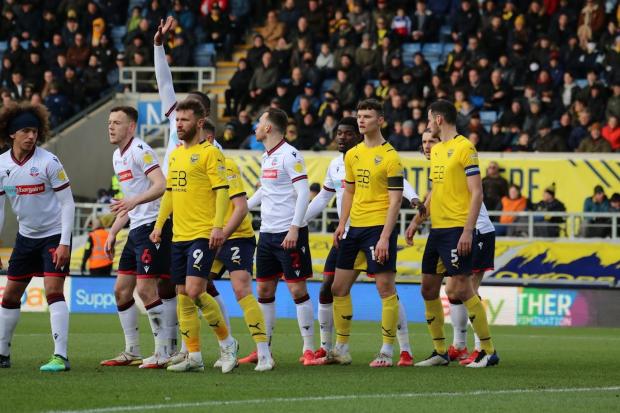 Oxford United get ready to defend a set piece against Bolton Wanderers. Picture: Steve Daniels