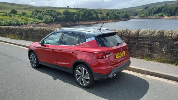 Witney Gazette: The SEAT Arona on test in West Yorkshire, pictured next to Digley Reservoir in Kirklees (left) and near Castle Hill, Huddersfield (top left)