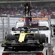 Daniel Ricciardo’s Renault is carried by a truck after an exhaust issue forced the Australian to retire from the German Grand Prix at Hockenheim Picture: AP Photo/Jens Meyer