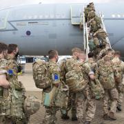Handout photo 14/08/21 issued by the Ministry of Defence (MoD) of UK military personnel prior to boarding an RAF Voyager aircraft at RAF Brize Norton in Oxfordshire, as part of a 600-strong UK-force sent to assist with the operation to rescue British