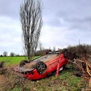 CRASH: Drink driver crash leaves car smashed on its roof. Picture by Thames Valley Police