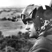 Brian Jopling looks out of a Puma helicopter over Rhodesia during the transition to black majority rule in 1980