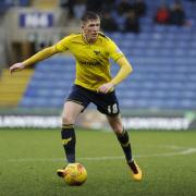 Oxford United midfielder John Lundstram hopes to return against Luton Town today after a three-match ban