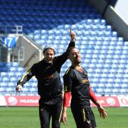 Danny Hylton is relishing the biggest game of his career against Wycombe Wanderers today, but says the Oxford United players are in a relaxed mood. Judging by this light-hearted moment in training on Thursday, where Hylton jokes with Kemar Roofe, he is