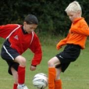 League.TUSSLE: Freeland's Kai Patton (left) battles for the ball in midfield with Ducklington's Rowan Prosser during his side's 2-1 victory in the Under 10 C League