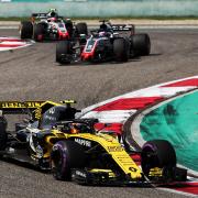 RACE TIME: Renault’s Carlos Sainz, pictured leading the Haas duo of Romain Grosjean and Kevin Magnussen in the Chinese Grand Prix two weeks ago, is targeting improvement in Azerbaijan - Picture: XPB/James Moy Photography Ltd