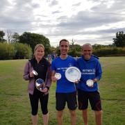 ALL SMILES: Witney RR’s (from left) Lisa Butler, Sam Upton and Tony Lock at the Pangbourne 10k Picture: Jen Horseman