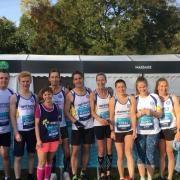 ALL SMILES: Witney RR members at the Oxford Half Marathon Picture: Tony Burkett