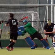 Witney goalkeeper Simon Howells saves Sam Hines’ shot during the draw with Oxford University 2nd   Pictures: Ric Mellis