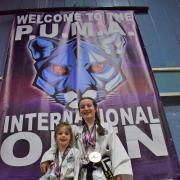 Sharleigh Hillier (left) and Paisley Hillier at the PUMA International Taekwondo Open Championships
