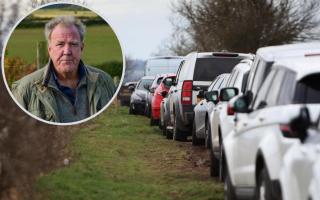 Racing driver blasts council posting video of parking chaos outside Diddly Squat Farm