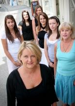 Erika Oswin, front, with her staff at Oxford International College of Beauty 